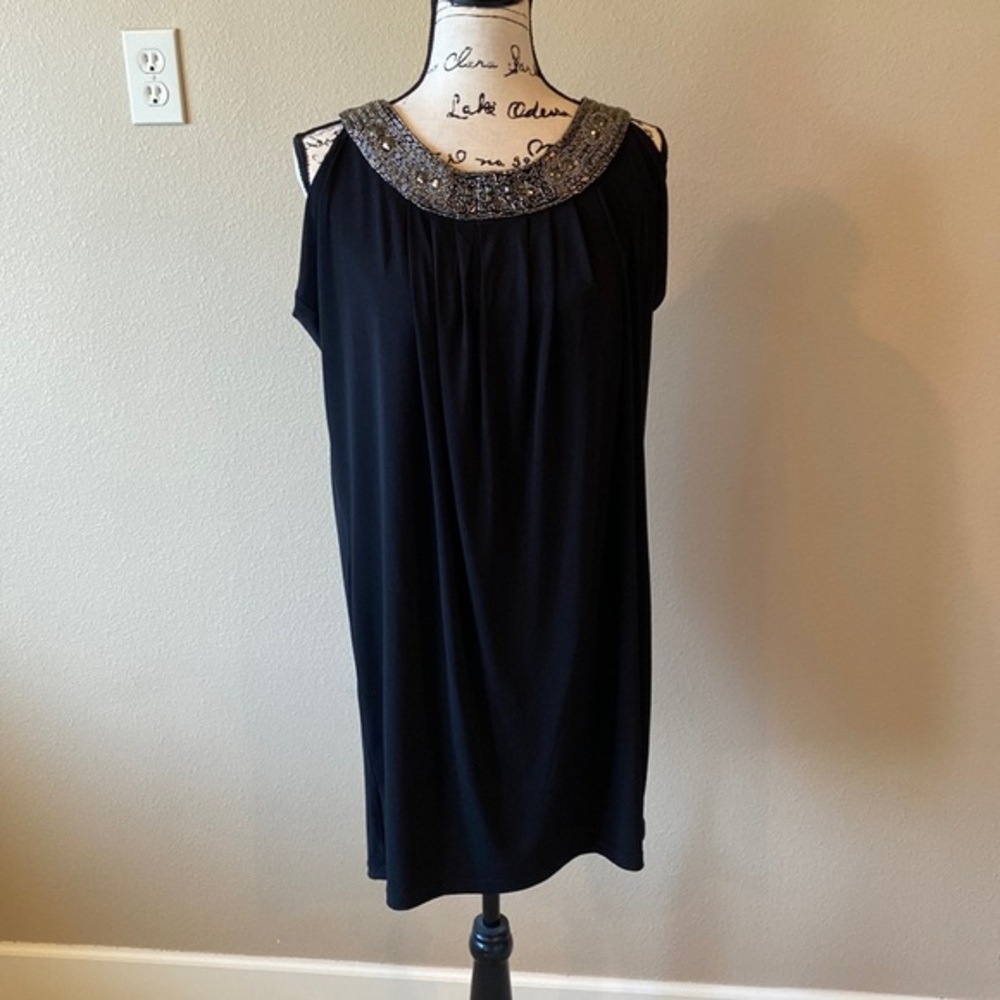 Stunning black dress with beaded neckline